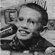Pixelated photo of smiling tween boy